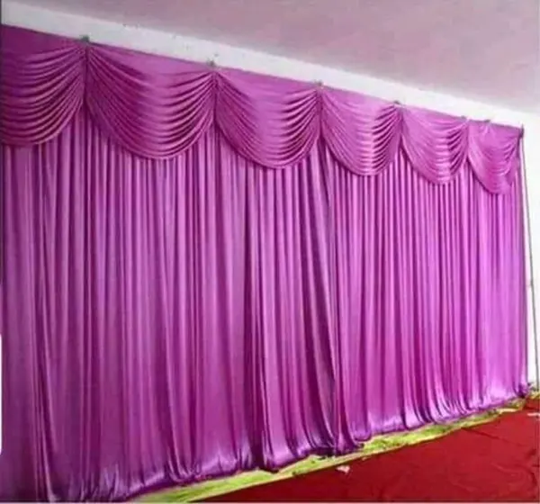 Magenta backdrop with swag top