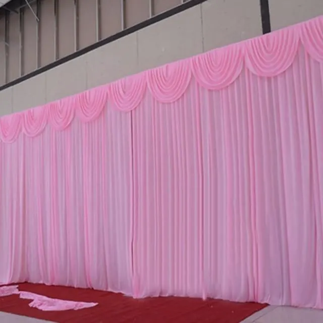 Baby pink backdrop with swag top