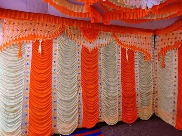 Orange and white tent wall drapes