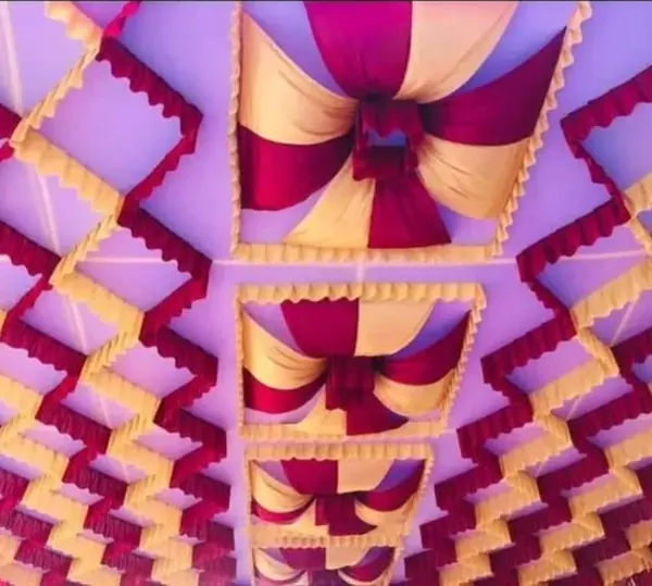 Stepped jaali with swags, maroon and yellow